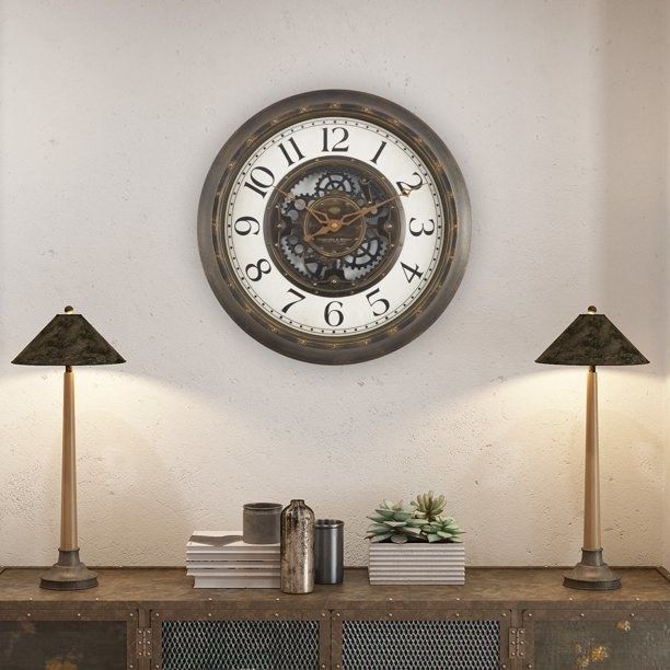 The wall clock sits above the hall table, its hands pointing at 10 and 2.