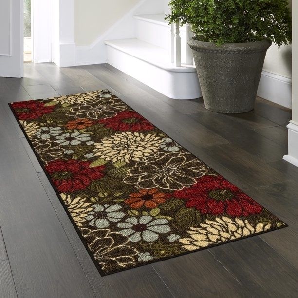 The floral rug runner placed in an entryway.