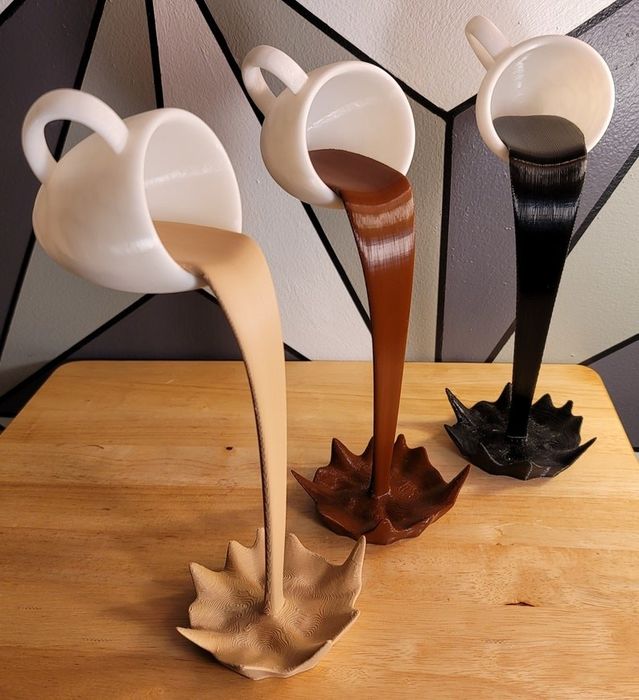 A sculpture in the shape of a coffee cup.