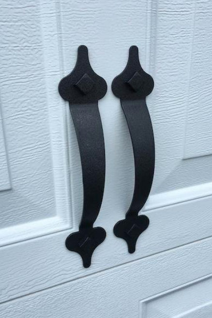 Close-up shot of sleek metal handles, adding a refined touch to the design.