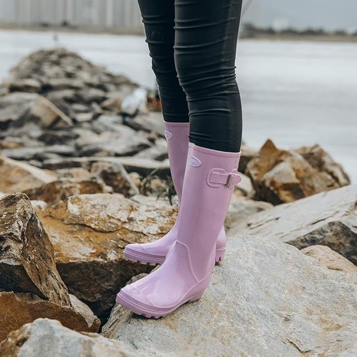 Person wearing lavender-colored rain boots