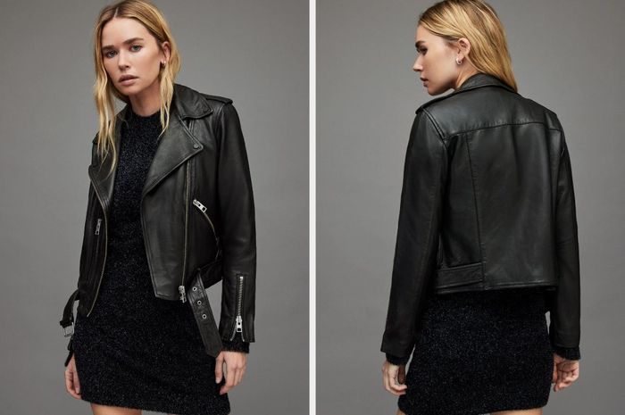 Two photos of a model wearing the black leather jacket.