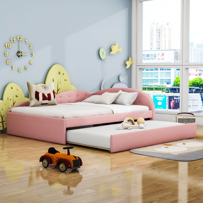 This children's bedroom features a pink bed with a trundle bed, along with cheerful decor including a wall clock, bird-shaped artwork, and a toy car on the floor, creating a playful and lively atmosphere.