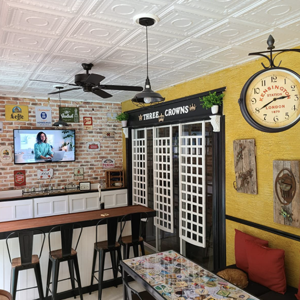 A reviewer's den featuring faux ceiling tiles that add a distinctive touch.
