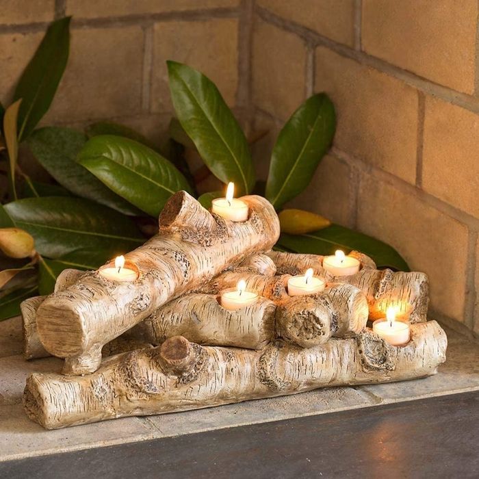 Close-up of the faux wood and tea light candles, creating a warm and serene ambiance.