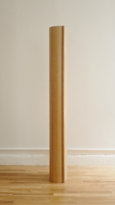 A bamboo divider that can be easily rolled up for storage.