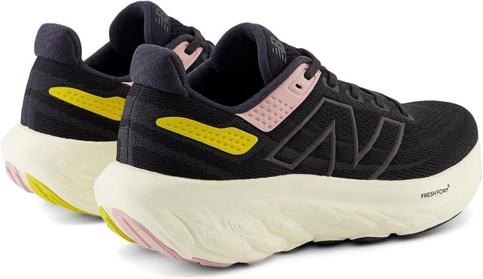 A pair of New Balance sneakers with a standout sole design, presented against a clean white background for shopping purposes
