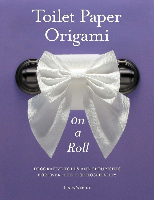 Toilet Paper Origami, beautifully displayed on a roll.