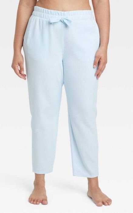 Light blue ribbed sweatpants.