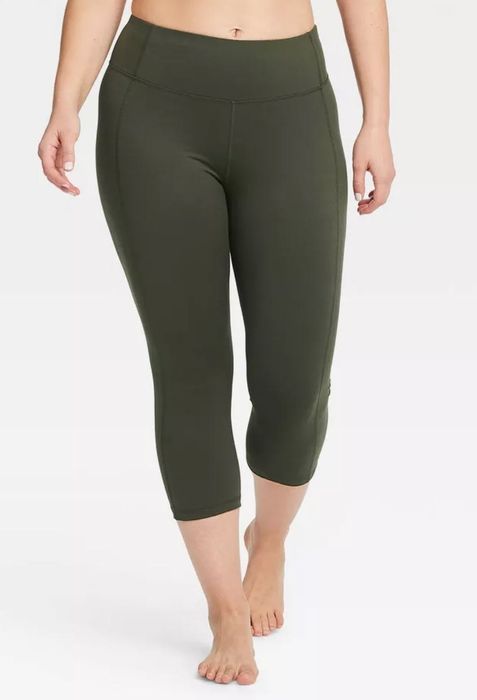 model wearing olive green capri leggings