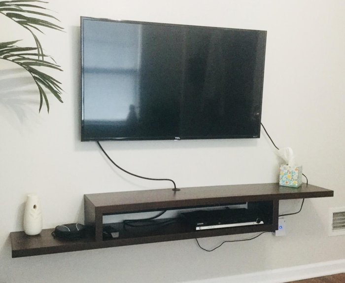 Image of the brown TV stand provided by the reviewer