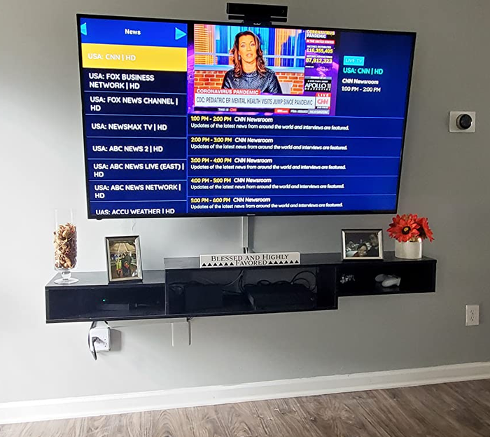 A reviewer’s image of a black TV stand.
