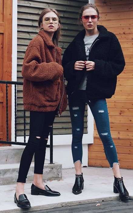 The model wears a fleece jacket.