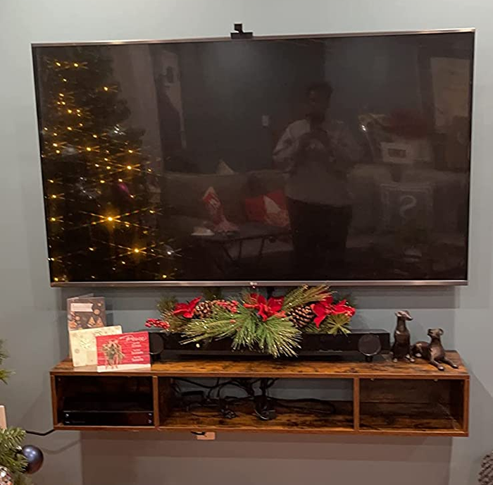 Customer-submitted image of brown TV stand
