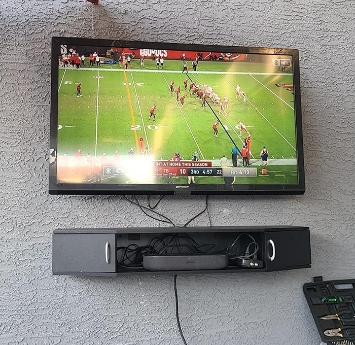 Customer-submitted image of gray TV stand