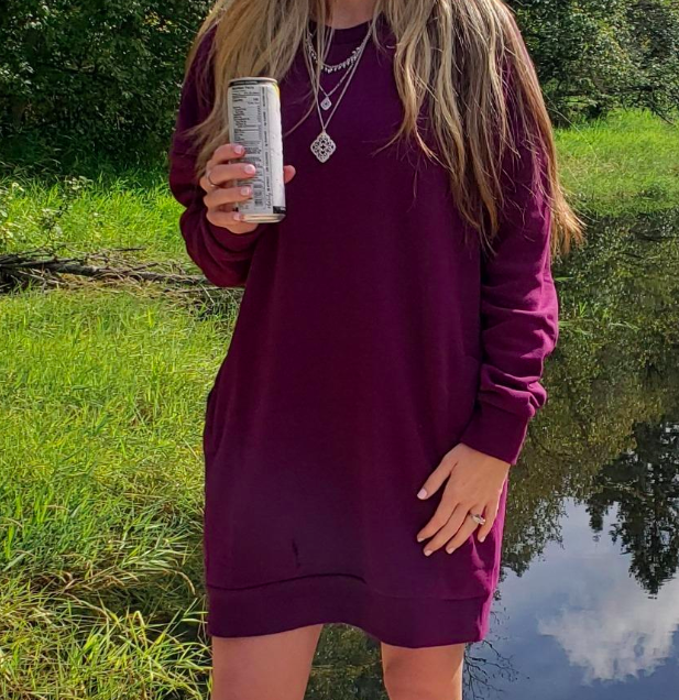 A customer review image showing them in the burgundy tunic.