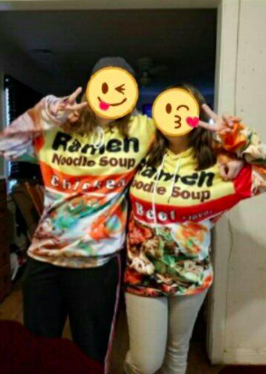 Two reviewers sporting the chicken and beef ramen hoodies