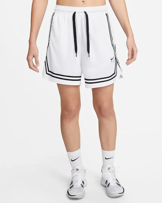 A model showcasing Nike basketball shorts