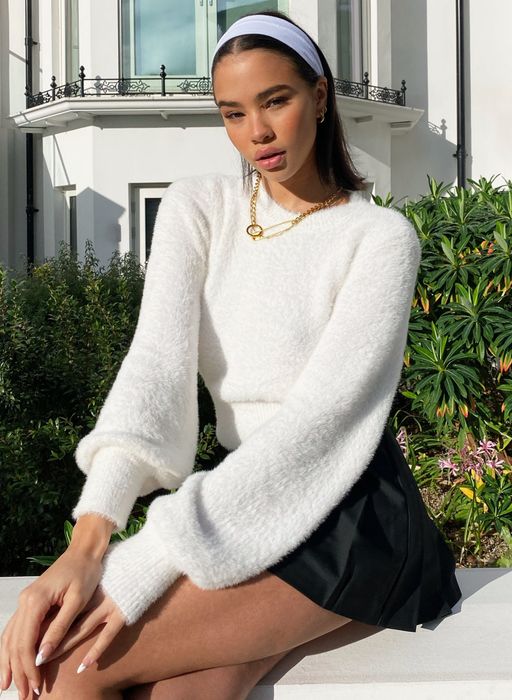 A model is wearing the sweater.