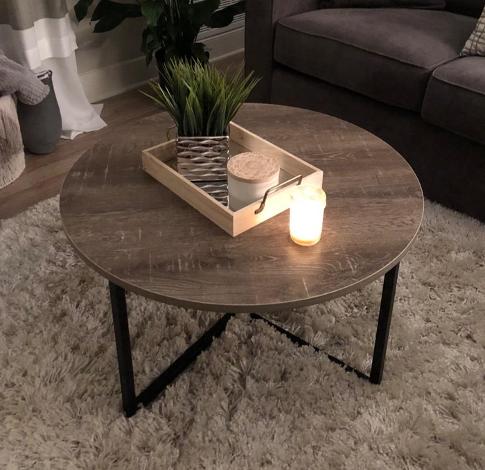 Customer photo of the brown round coffee table with a candle on top