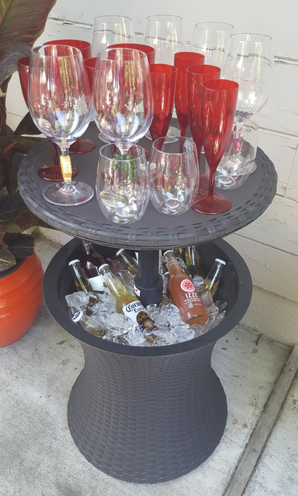 Customer photo of the side table with ice and drinks inside it