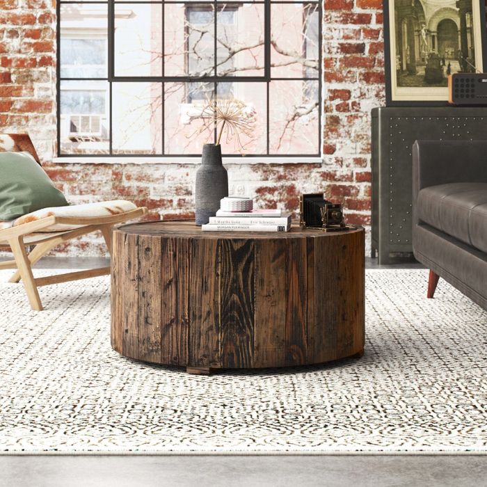Image of the brown wood coffee table in a living room setup