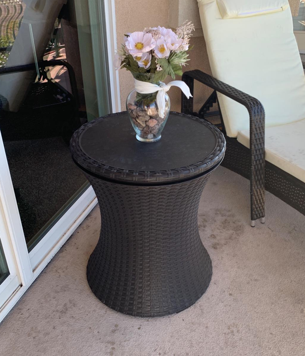 Customer photo of the side table with a flower vase on top
