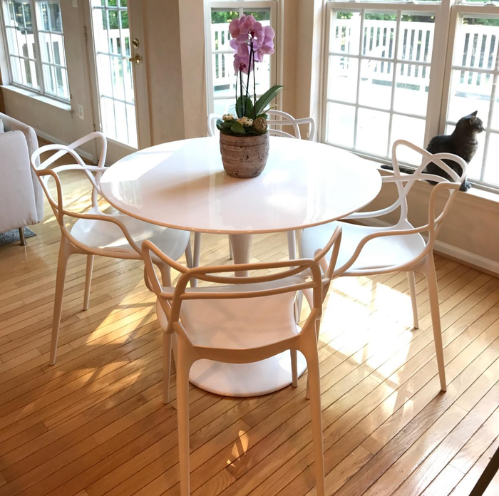 Customer image of the 40-inch white table paired with white chairs