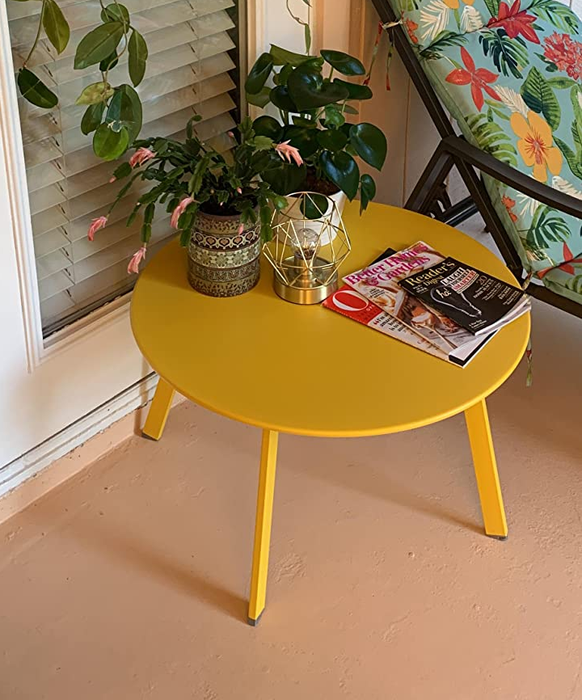 Reviewer image of a yellow outdoor coffee table