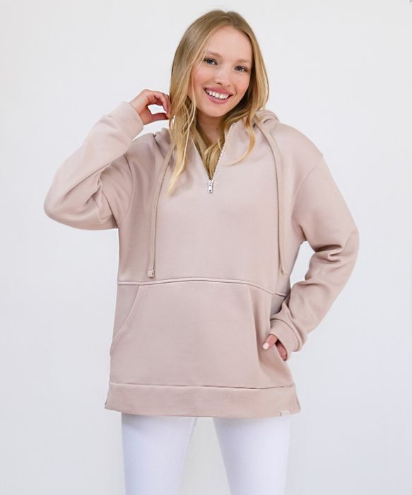 a model wearing the oversized dusty rose hoodie