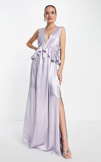 a model posing in the soft lilac dress