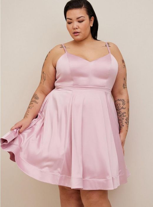 A close-up shot of the pink satin dress.