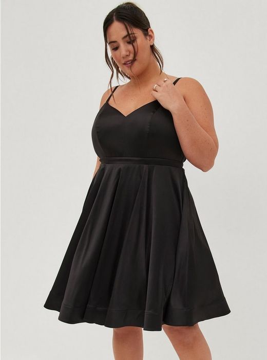 Another model posing in black.