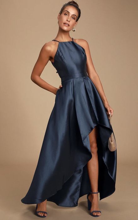 front view of a model wearing the dress in navy