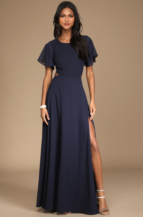 a model wearing the dress in navy blue