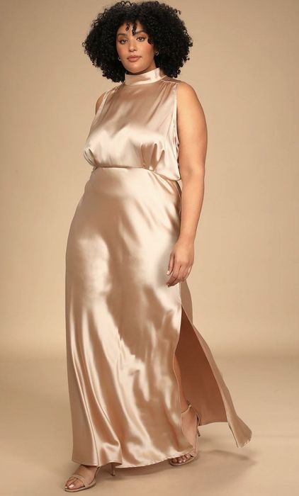 front view of a model wearing this dress in beige