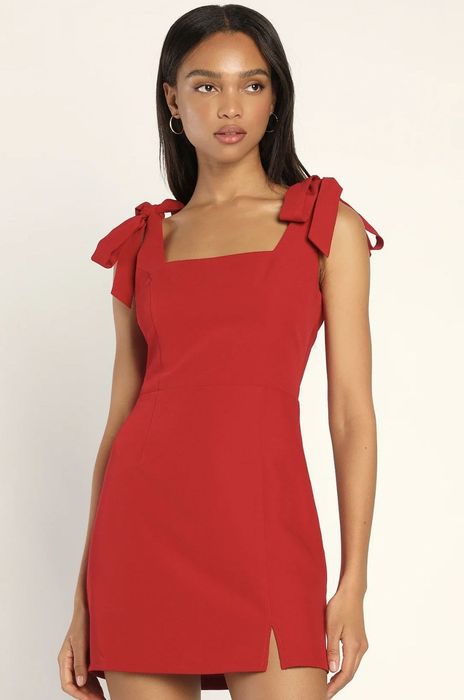 a model showcasing the dress in red