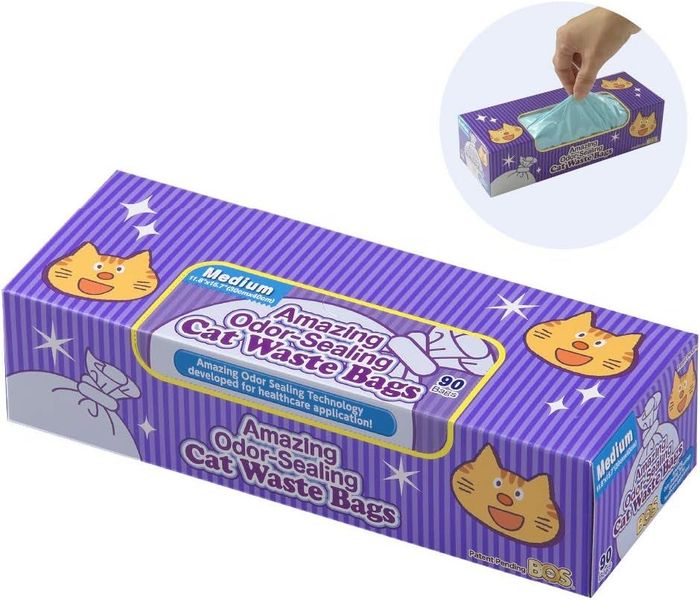 A box of medium-sized cat waste bags with odor-blocking technology; includes an inset image of a hand pulling a bag out of the box
