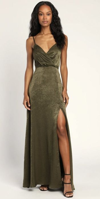 a model wearing the dress in green