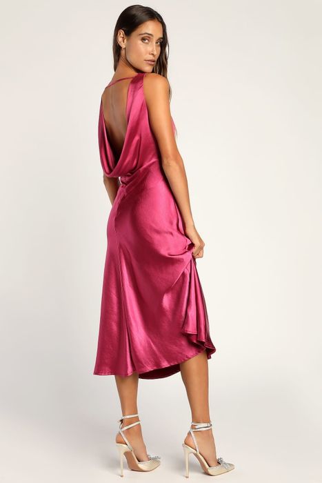 another model wearing the dress in a soft pink