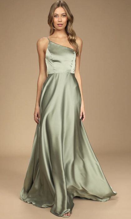 a front view of a model wearing the dress in green