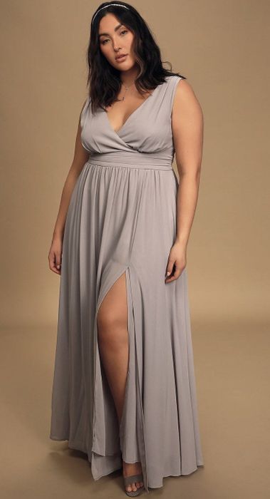 model highlighting the slit in the dress