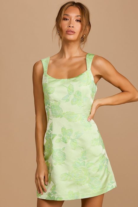 front view of a model wearing the dress in green