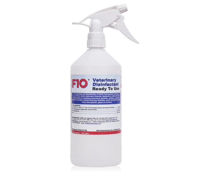 A bottle of F10 Veterinary Disinfectant placed against a simple background.