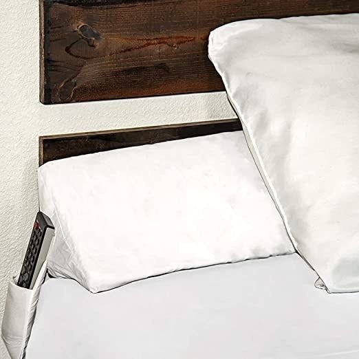 A pillow placed on a bed.