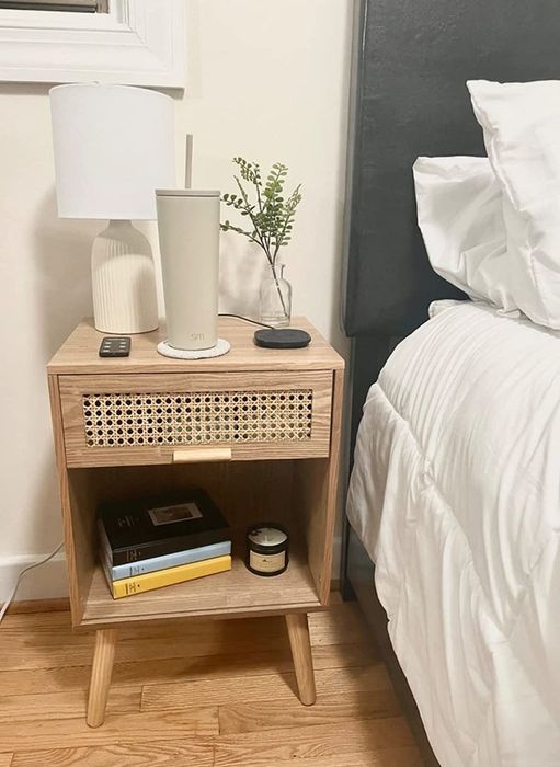 A photo from a reviewer showing the nightstand in their room