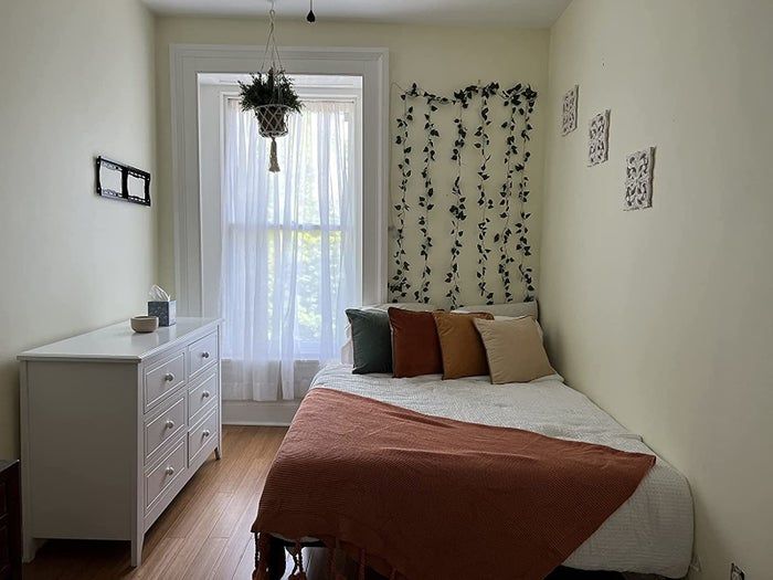 A photo from a reviewer showcasing the pillows on a bed