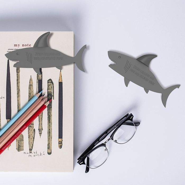 Flat shark bookmarks with 3D fins.