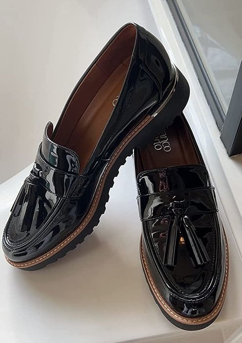 The sleek black patent shoes.