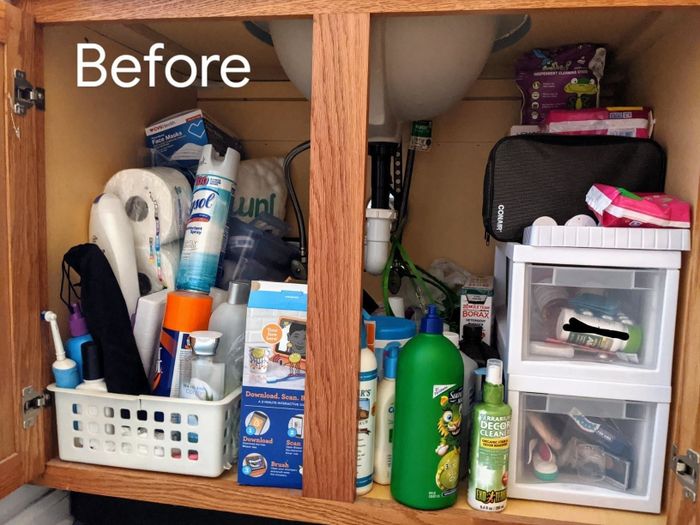A reviewer’s before shot of their untidy and cluttered cabinets.